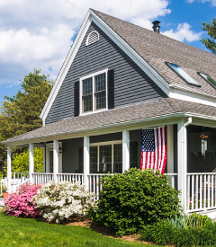 A beautiful house with a garden in front